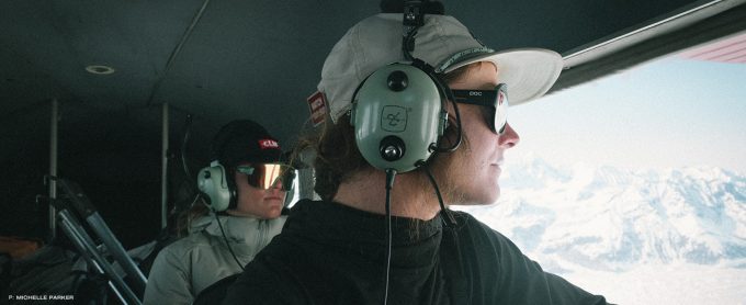 The crew scopes for camp aboard the Talkeetna Air Taxi.